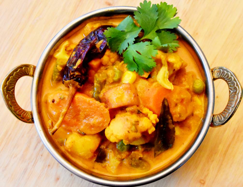 Navratan Vegetable Korma, mixed vegetable curry in creamy tomato sauce