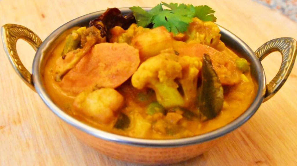 Navratan Vegetable Korma, mixed vegetable curry in creamy tomato sauce