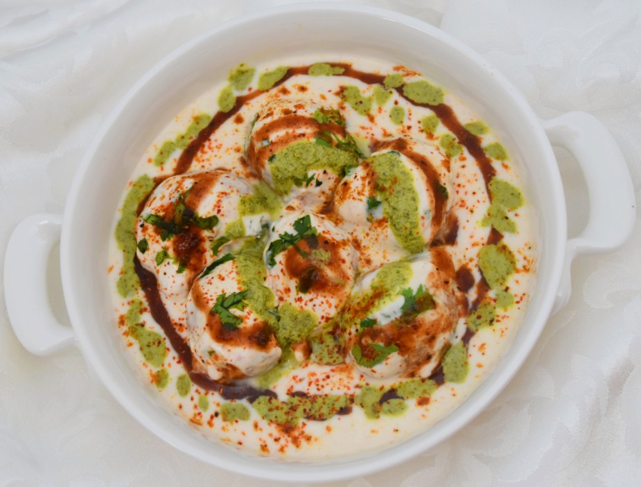 Dahi Vada/wara/bhalla - lentil fritter in a yogurt sauce with tangy and spicy chutneys