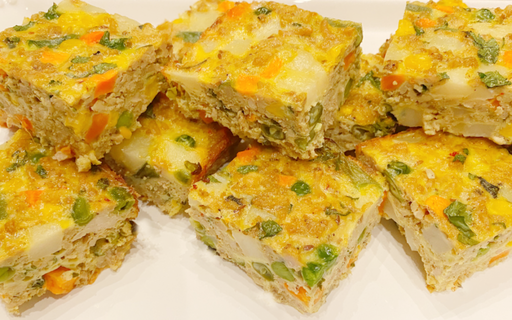 Lagan ni Seekh - a baked meat, vegetable and egg appetizer